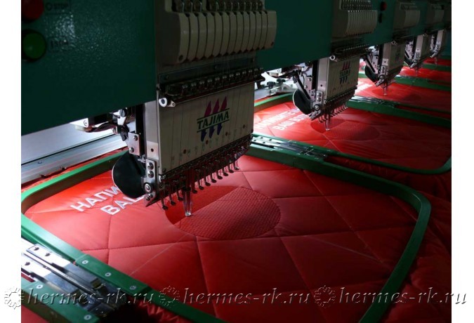 Копоративная вышивка на жилетах